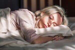 Woman in need of sleep apnea treatment New York