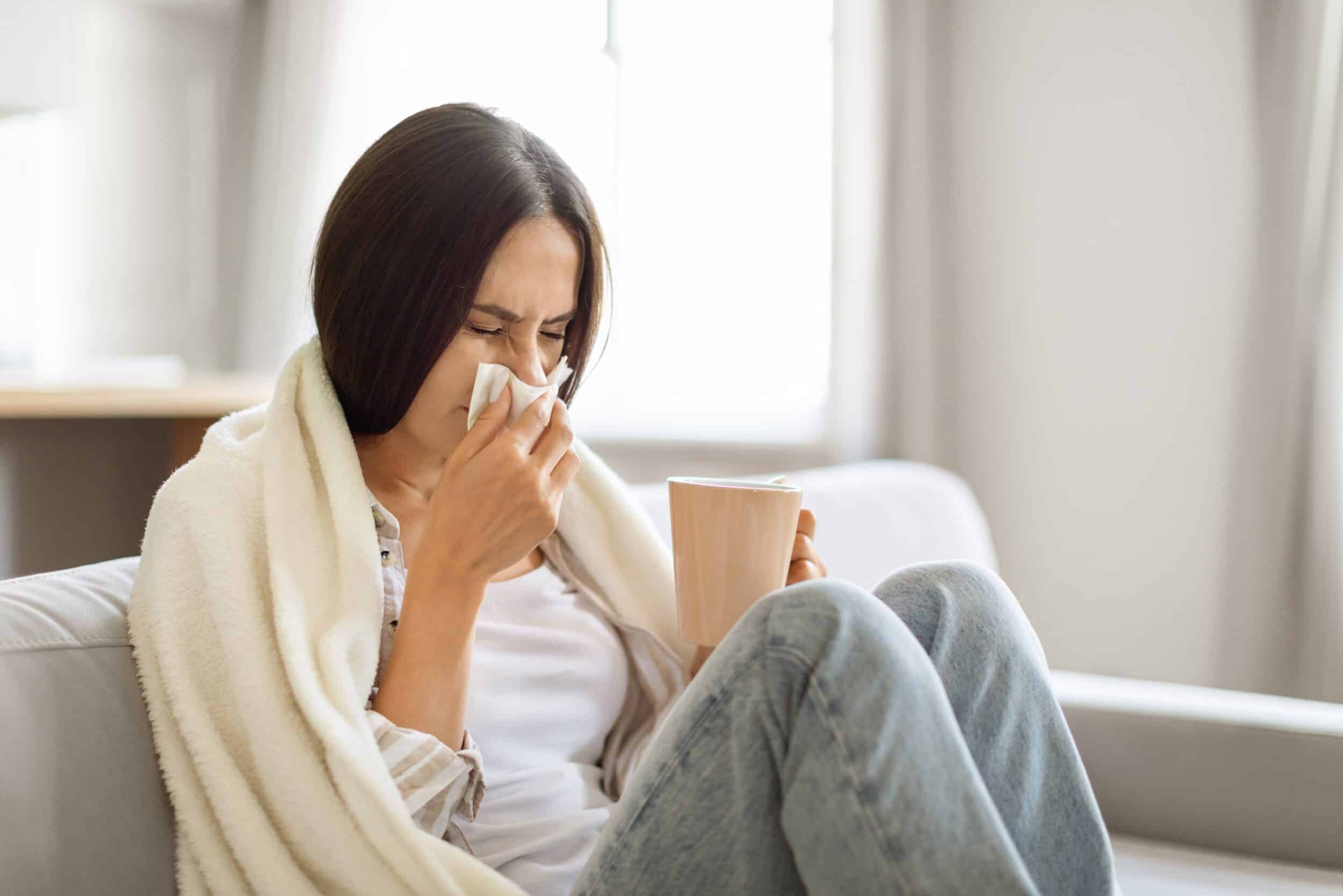 Woman experiencing symptoms during sinusitis in New York, NY
